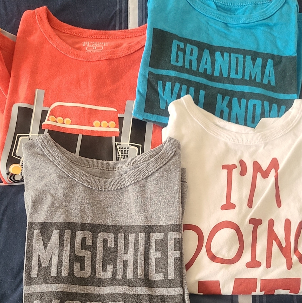 A set of 4 gently used toddler boy shirts from Children's Place.